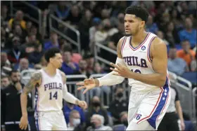  ?? PHELAN M. EBENHACK — THE ASSOCIATED PRESS ?? Philadelph­ia 76ers forward Tobias Harris (12) celebrates after making a 3-pointer during the second half of an NBA basketball game against the Orlando Magic, Wednesday, Jan. 5, 2022, in Orlando, Fla.