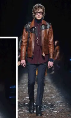 ??  ?? COACH (Above) Caramel leather jacket, burgundy wool shirt, blue wool pants, and backpack; (left) Aubergine and camel leather shearling jacket, printed dress, and oversized black and camel backpack