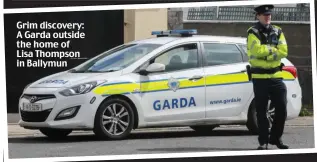  ?? ?? Grim discovery: A Garda outside the home of Lisa Thompson in Ballymun