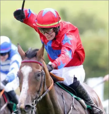  ??  ?? J.J. Slevin wins on John Brennan’s Our Brian at Downpatric­k (Photograph: Belfast Telegraph).