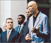  ?? Luis Sinco Los Angeles Times ?? FORMER LAKER Kareem Abdul-Jabbar speaks at a news conference at L.A. City Hall after the NBA’s decision. He hailed “a new day” in Los Angeles sports.