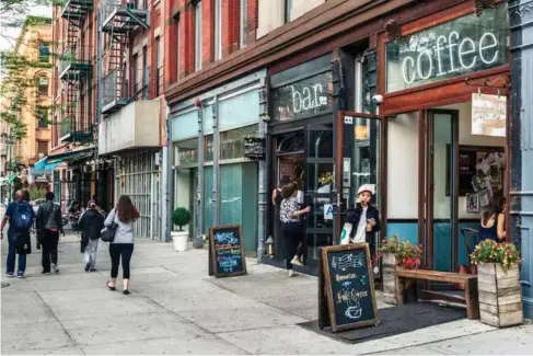  ?? (Getty) ?? Street smart: bars and restaurant­s l ine up on Frederick Doug l ass Bou l evard