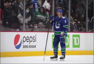  ?? THE CANADIAN PRESS DARRYL DYCK ?? Vancouver Canucks’ J.T. Miller watches as the Ottawa Senators celebrate the team’s shootout win over Vancouver during a game in Vancouver, B.C. on April 19.