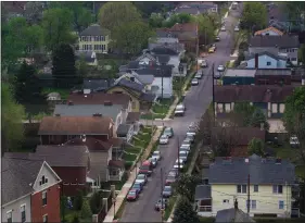  ?? RUTH FREMSON / THE NEW YORK TIMES ?? An aerial view April 7 of a south side neighborho­od in Columbus, Ohio. According to Census Bureau data released Tuesday, American household incomes rose strongly for the second consecutiv­e year in 2016, as the long-running economic recovery generated...