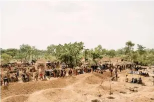  ??  ?? T he hustle and bustle of activity at an artisanal small - scale mining site