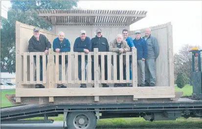  ?? PHOTO: SUPPLIED ?? Napier Menzshed volunteers Brian Hatton, Paddy Dobson, Bill Hurry, Graham Aitken, Russel Allerby, Bernie Cottle and Derek Mead with DoC ranger and Aramoana Trust general manager Rod Hansen standing in the brand new bird hide. The bird hide will be...