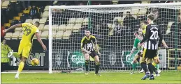  ??  ?? GOING IN: Tyrone Barnett scores for Cheltenham