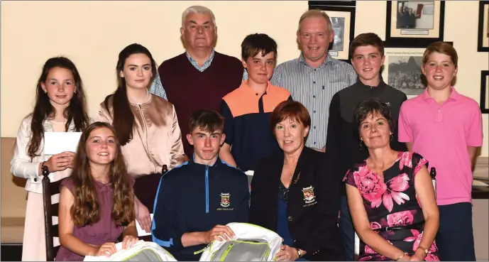  ?? Photo by Michelle Cooper Galvin ?? Mary O’Rourke Lady Captain Killarney Golf Club (third from left) presenting first prize in her Lady Captain’s Junior competitio­n to Corrina Griffin (girls) and Niall McCarthy (boys) with Angela O’Connor Juvenile Officer (centre row from left)...