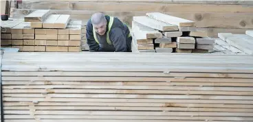  ?? PAUL CHIASSON / THE CANADIAN PRESS ?? The U. S. has announced softwood lumber tariffs on Canadian imports of up to 24 per cent. The move was the fifth dispute over softwood lumber over four decades.