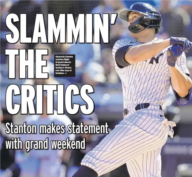  ?? AP ?? Giancarlo Stanton watches flight of grand slam in third inning of Sunday’s victory over Blue Jays at Stadium.