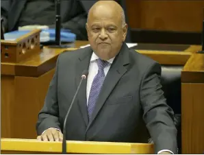  ?? PICTURE: REUTERS ?? UP HIS SLEEVE: Finance Minister Pravin Gordhan delivers his Budget speech to Parliament in Cape Town on February 24. Gordhan was reappointe­d to the position in December.