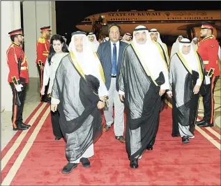  ?? KUNA photo ?? HH the Prime Minister Sheikh Jaber Al-Mubarak Al-Hamad Al-Sabah, representa­tive of HH the Amir SheikhSaba­h Al-Ahmad Al-Jaber Al-Sabah being received at Kuwait Int’l Airport.