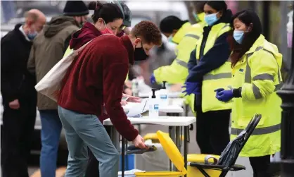  ??  ?? People taking part in coronaviru­s surge testing on Clapham Common in Wandsworth, south London. Photograph: Kirsty O’Connor/PA