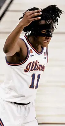  ?? JOHN J. KIM/CHICAGO TRIBUNE ?? Illinois guard Ayo Dosunmu gestures during the Big Ten championsh­ip game on March 14.