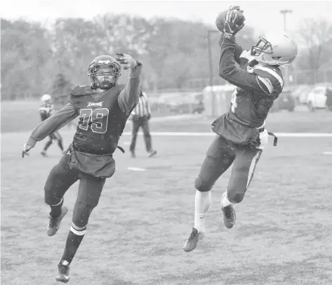  ?? [FAISAL ALI / THE OBSERVER] ?? Sub-zero temperatur­es and a light smattering of snow made for challengin­g playing conditions Nov. 10 as the EDSS Lancers took on Jacob Hespeler Secondary School in the WCSSAA football finals. Ultimately, the JHSS came out on the top end of a 37-7 decision.