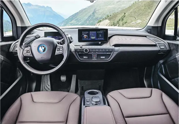  ?? BMW CANADA ?? The i3s’ interior has available seatbelts in BMW iBlue — but the vehicle’s real difference is found under the hood and undercarri­age.