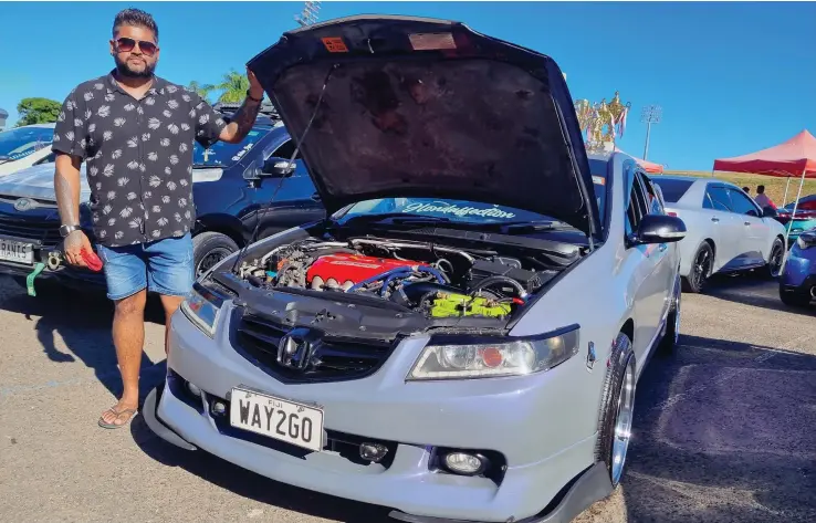  ?? In Suva. Photo: Laiseana Nasiga ?? Shivneel Kumar with his 2004 Honda Accord Euro during a car show