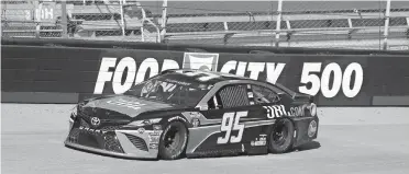  ??  ?? Norman native Christophe­r Bell shoots past an empty grandstand on Sunday during a NASCAR Cup Series race at Bristol Motor Speedway. Bell finished ninth. [MARK HUMPHREY/POOL PHOTO VIA USA TODAY NETWORK]