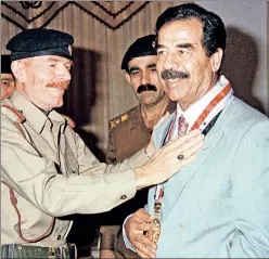  ??  ?? The good ol’ days? Saddam and his former aide, Ezzat al-Douri.