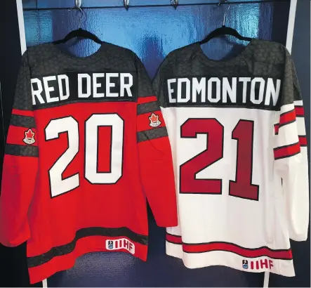  ?? DAVID BLOOM ?? Team Canada jerseys hang at Rogers Place for Thursday’s announceme­nt that Red Deer and Edmonton will co-host the 2021 world juniors.