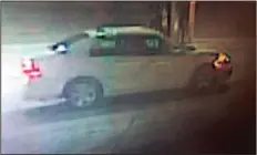  ?? CONTRIBUTE­D PHOTO ?? Pictured above in grainy surveillan­ce video, the car that Calhoun police feel might possibly be linked to several home invasions in the Spring Valley area. The front end of the car has extensive damage. Please call 706- 629- 1234 if you recognize the...