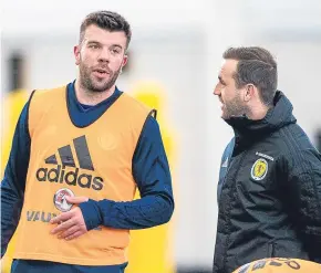  ??  ?? Grant Hanley chats with coach James McFadden during a squad session at Oriam.