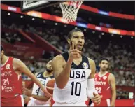  ?? Ng Han Guan / Associated Press ?? The United States’ Jayson Tatum reacts after scoring against Turkey in a FIBA Basketball World Cup game at the Shanghai Oriental Sports Center in Shanghai in 2019. Kobe Bryant wore No. 24 and No. 8 with the Los Angeles Lakers, but he donned No. 10 for USA Basketball when he helped the Americans capture gold medals at the 2008 and 2012 Olympics.