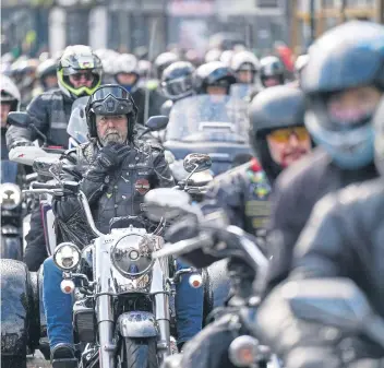  ?? ?? MOVING TRIBUTE: Bikers saddle up en masse in Beverley Market Place yesterday morning at the start of a memorial ride to Scarboroug­h for Dave Myers, of the Hairy Bikers, who died in February after a battle with cancer.