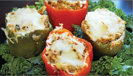  ?? PHOTO BY EMILY RYAN ?? These gluten-free stuffed peppers include quinoa.