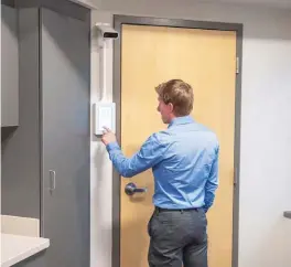  ??  ?? Cameras mounted on the walls of the inpatient rehab unit allow an AI system to watch for cues that a patient is getting ready to leave their bed.