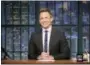  ?? LLOYD BISHOP — NBC VIA AP ?? This photo released by NBC shows Seth Meyers at his desk during a taping of, “Late Night with Seth Meyers,” in New York. Meyers devotes up to 12 minutes of air time, three to four days a week, about the Trump Administra­tion with a segment called A...