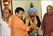  ?? PHOTO: Abhishek Shukla ?? BJP leader Arvinder Singh Lovely with Amit Shah and Manoj Tiwari at a press conference in New Delhi on Tuesday.