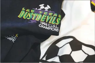  ?? STEVE MARCUS ?? Commemorat­ive Las Vegas Dustdevils T-shirts celebrate the team’s Continenta­l Indoor Soccer League championsh­ip in 1994.