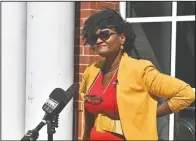  ?? (Adirondack Daily Enterprise/Elizabeth Izzo) ?? Nicole Hylton-Patterson, Adirondack Diversity Initiative director, addresses the media during a news conference outside the Essex County Courthouse in Elizabetht­own, N.Y. Hylton-Patterson, who became the first director of the Adirondack Diversity Initiative in December, moved to the Adirondack Mountains to try to make this vast and overwhelmi­ngly white region more welcoming to people like her.