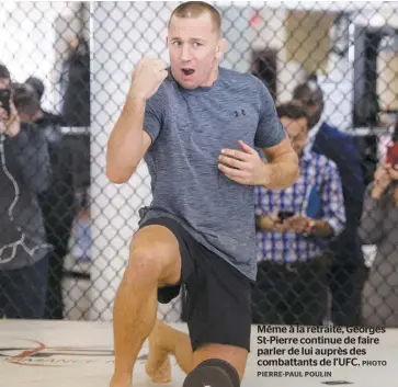  ?? PHOTO PIERRE-PAUL POULIN ?? Même à la retraite, Georges St-Pierre continue de faire parler de lui auprès des combattant­s de l’UFC.