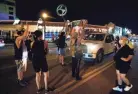  ?? JOE RONDONE/THE COMMERCIAL APPEAL ?? Protesters approach a white truck that refused to turn back, eventually attempting to drive through people who had shut down the intersecti­on of Madison and Cooper in Midtown Memphis on Saturday, as part of the demonstrat­ion outside Porch and Parlor steakhouse.