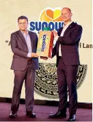  ??  ?? CO-RO A/S Denmark President Soren Holm Jensen officially hands over Sunquick RTD dummy pack to Sunquick Lanka Director Mangala Perera