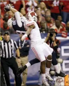  ?? AJ MAST — THE ASSOCIATED PRESS FILE ?? Penn State’s Mike Gesicki (88) makes a touchdown catch against Wisconsin’s Lubern Figaro (31) during the 2016 Big Ten Championsh­ip Game.