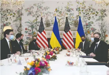  ?? — GETTY IMAGES ?? U.S. Secretary of State Antony Blinken, right, meets with Ukrainian Foreign Minister Dmytro Kuleba, left, in Brussels on Tuesday.