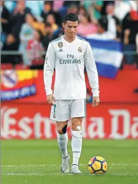  ?? ALBERT GEA / REUTERS ?? Cristiano Ronaldo looks dejected after Real Madrid 2-1 La Liga loss to Catalonian minnow Girona on Sunday.
