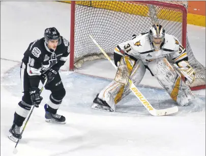  ?? DAVID JALA/CAPE BRETON POST ?? Former Cape Breton Screaming Eagle fan favourite Drake Batherson was a constant threat to goalie Kevin Mandolese during his return to Centre 200 on Sunday as a member of the visiting Blainville-Boisbriand Armada. Batherson, who was traded to the...