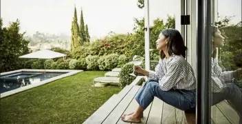  ?? GETTY IMAGES ?? One cure for that cooped-up feeling is outdoor living areas, as many are looking to make their backyard into an oasis.