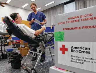  ?? Harry Lynch/Raleigh News & Observer ?? Blood donations across the nation totaled an estimated 11 million units last year, down from 14.2 million in 2013, and industry experts are concerned about the dearth of younger people donating.