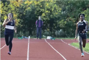  ?? CLIFFORD SKARSTEDT EXAMINER FILE PHOTO ?? Olivia Reevie, left, takes first place in a 100-metre race against Soleille Stanley at a meet hosted by the Kawartha Lakes Lightning Running Club on Oct. 17.