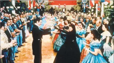  ?? New Line Cinema ?? “GONE WITH THE WIND,” above, inspired the hoop skirts and other costumes at a 1982 UC Berkeley frat dance.