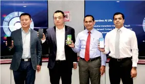  ??  ?? From left: Huawei Consumer Business Group Sri Lanka Head of Products David Xukai, Country Head Peter Liuyi, Singer Sri Lanka PLC Director Operations Jagath Perera and Marketing Director Shanil Perera