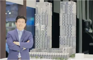  ?? PHOTO COURTESY OF GROUPE BRIVIA ?? Kheng Ly, president and CEO of Groupe Brivia, with a model of the YUL complex being built on René-Lévesque Blvd. and Mackay St.