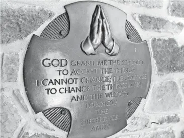  ?? [PHOTO BY STEVE SISNEY, THE OKLAHOMAN ARCHIVES] ?? A plaque inscribed with the words to the Serenity Prayer serves as visible support to residents of OKC Metro Alliance’s Firstep recovery program.