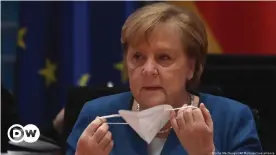  ??  ?? The pandemic saw Angela Merkel navigate rough waters during her final year as Germany's chancellor