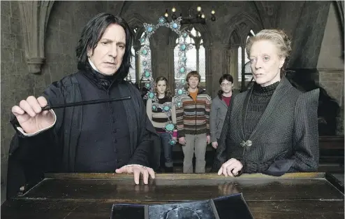  ?? JAAP BUITENDIJK ?? The late Alan Rickman as Professor Severus Snape with Maggie Smith in Harry Potter and the Half-Blood Prince.